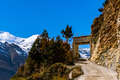 Trail By The Snowy Himalayan Mountains On The Annapurna Circuit Trek